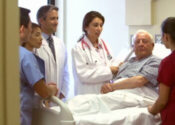 doctor listening to patient story in hospital