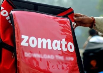 Zomato delivery partner riding bike